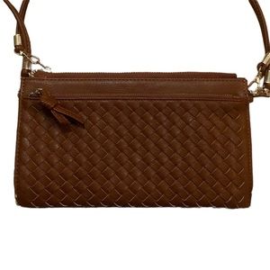 Brown woven crossbody shoulder or clutch bag with outside zipper pocket